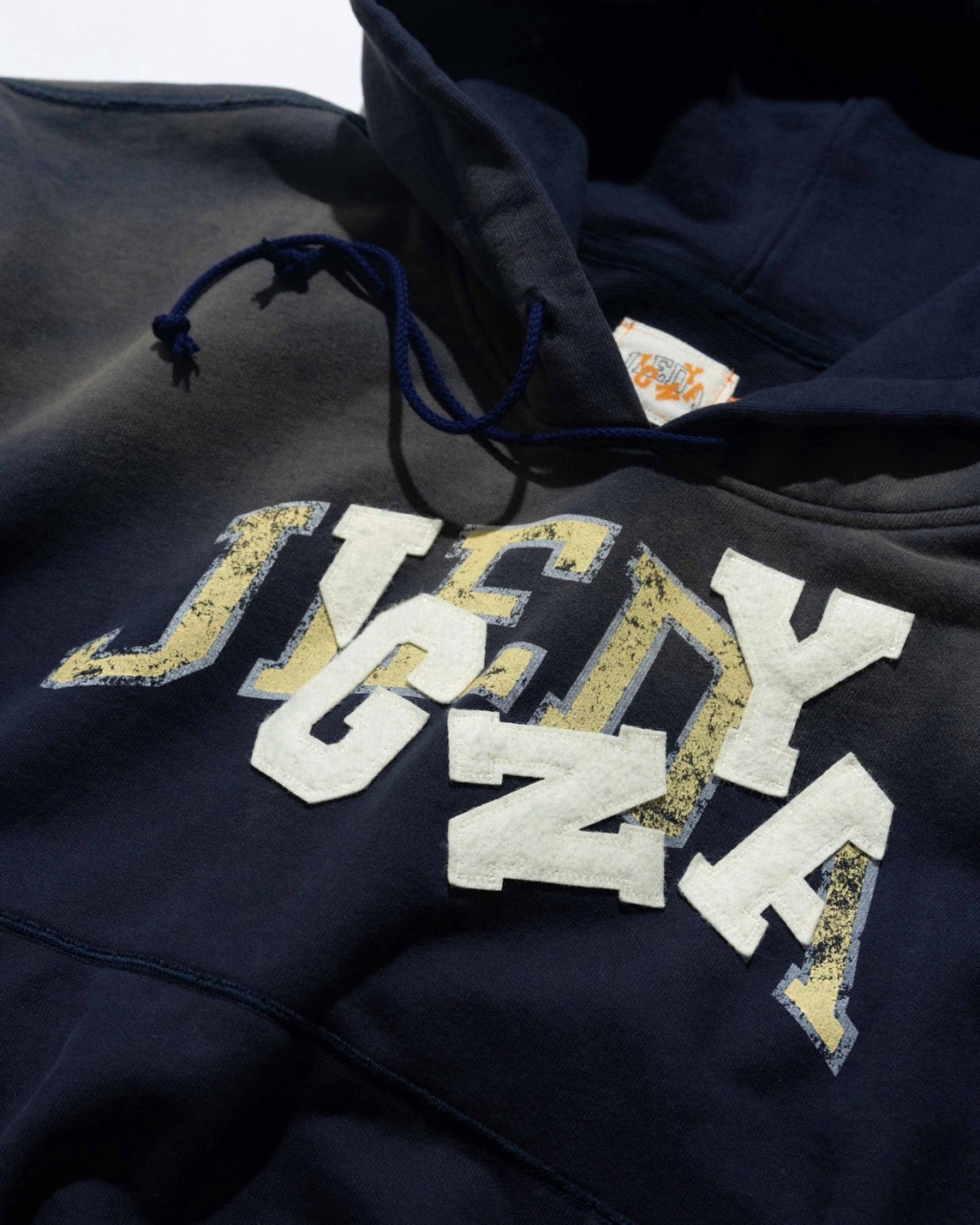 YANGI × JIEDA Vintage Distressed Fades Hoodie